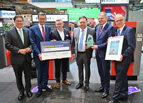 Verleihung Energie Genie an Fröling auf der Energiesparmesse